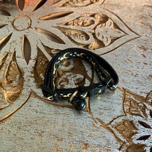 NEW HALLOWEEN never worn moon/spooky-style cat collar